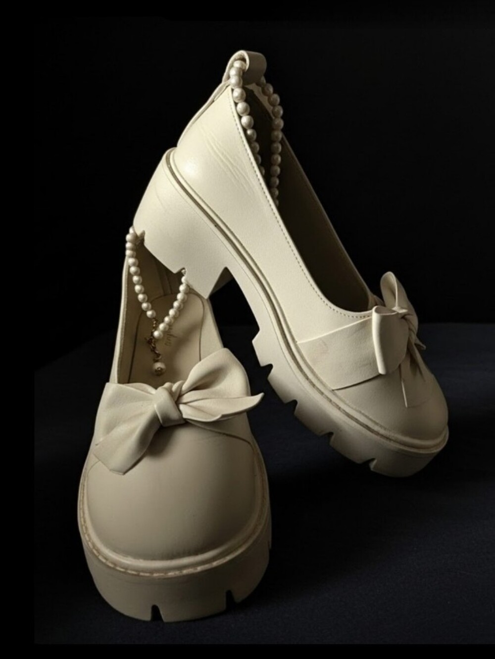 Retro-inspired Platform Loafers in a Soft Buttercream Finish